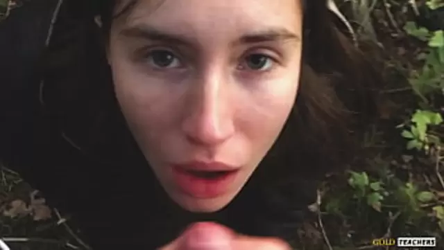 Russian slut sucks on a man in the October woods